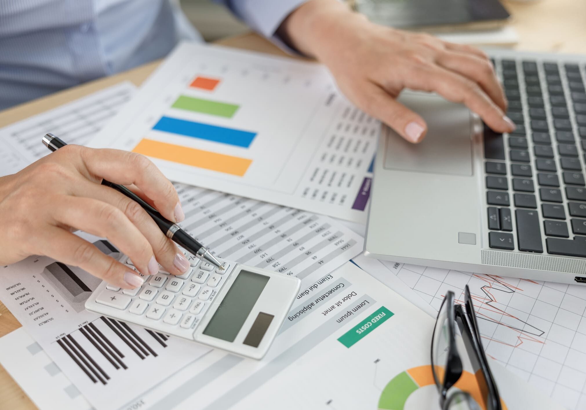 Small business tax documents, receipts, and calculator.
